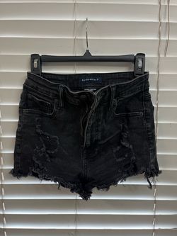 Black leather and shorts skirt and white shorts with beige.