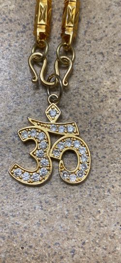 Gold Om Symbol Pendant Necklace