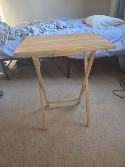 Tray with folding legs