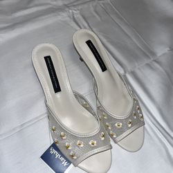White and yellow floral heels