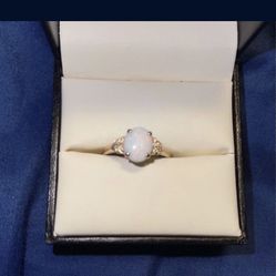 Size 10  10K Rose Gold Opal W/ 8 Diamonds Ring