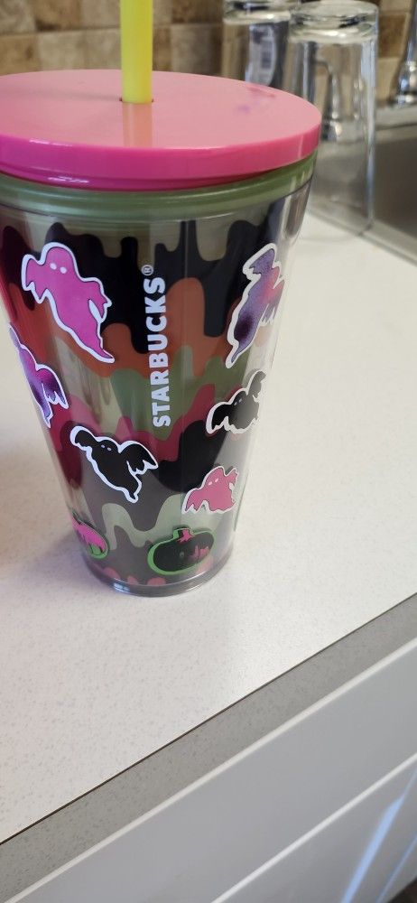 FIVE STARBUCKS CUPS