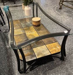 Beautiful large glass table on top – tiles underneath on wheels