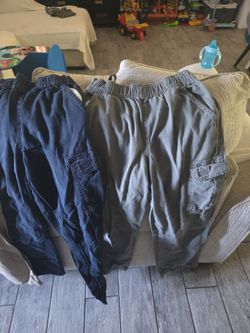 3 boy's cargo  pants  and one  regular size 14