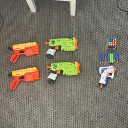 2 Nerf Dart Alpha Strike Fang 4 Shot+ 2 Nerf Zombie Strike Quadrot Gun Blasters 4 Shot+ 1 Nerf N-strike Elite Triad EX-3 Blaster+23 Darts
