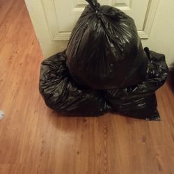 3 Big Bags Of Mixed Clothes For  $25.00    In Good Condition 
