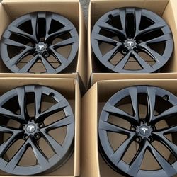 “21 Tesla model S Satin Black rims/wheels (exchange available)