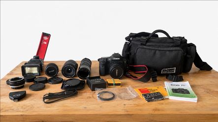 Canon EOS 7D DSLR Camera Bundle with Multiple Lenses, Batteries, Charger, Flash & Bag