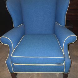 Blue Wingback Armchair With Yellow Piping