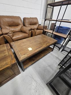 Wood coffee table with black metal frame