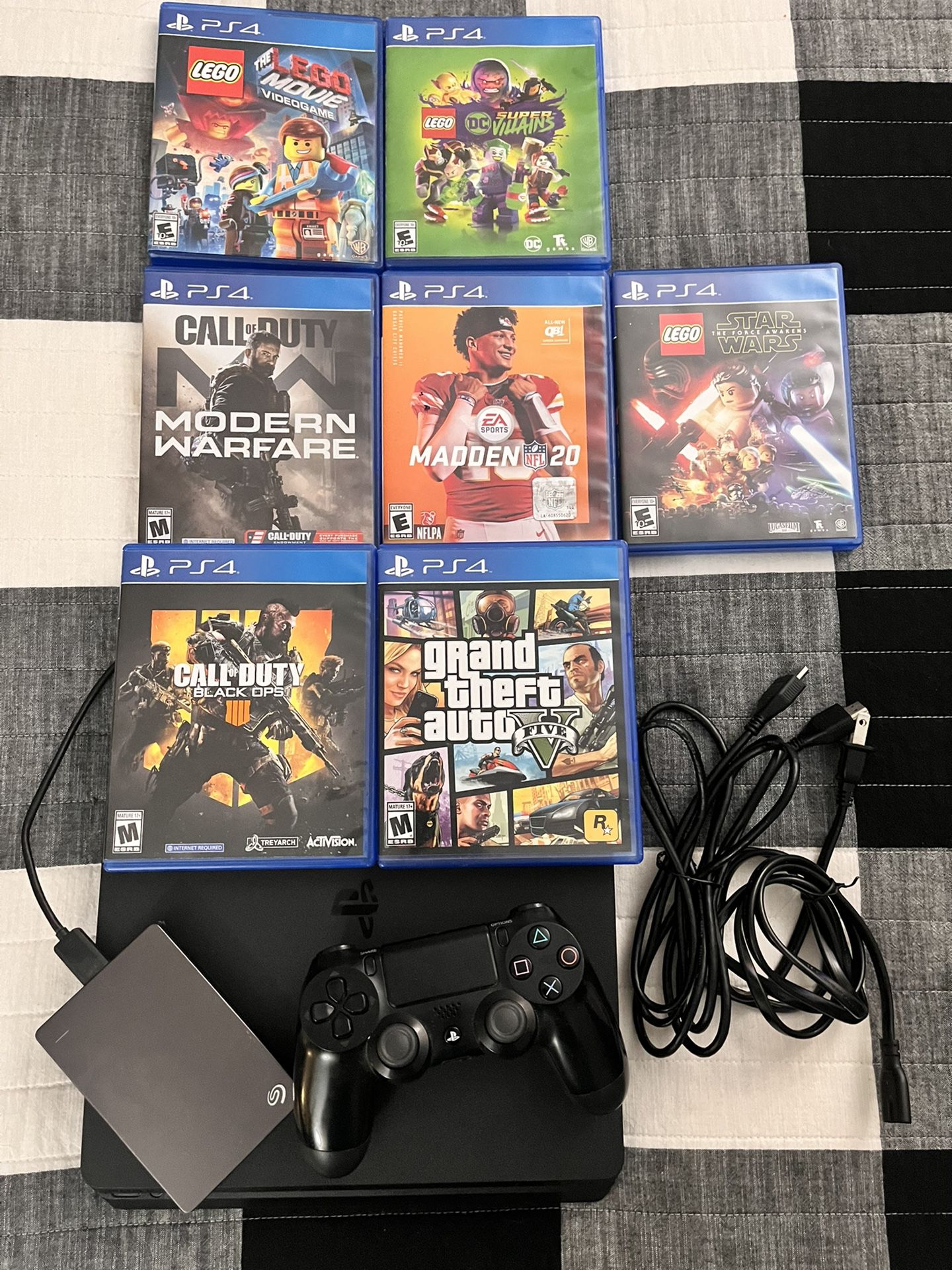 PS4 Slim with controller, External HDD and 7 Games!