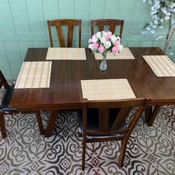 Solid Wood Dining Table With 5 Matching And Confortable Cushion Chairs.  