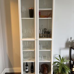 2 Tall Cabinets With Glass Doors 