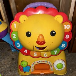 Fisher Price Sit, Stand, Ride Lion Toy