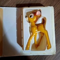 vintage Banbi figure with VHS storage case