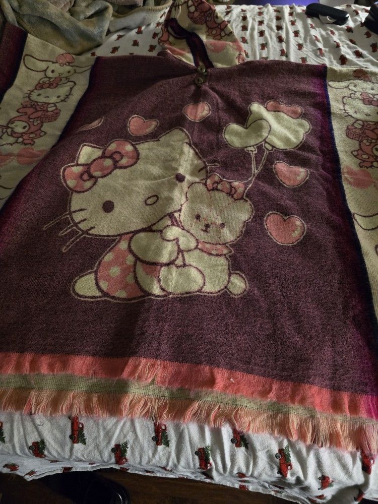 Hello kitty poncho adult