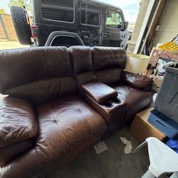 Dark brown leather reclining chairs