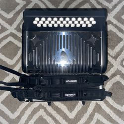Hohner Panther Accordion – 12-Bass, 31-Button, Excellent Condition - Comes with straps and case.