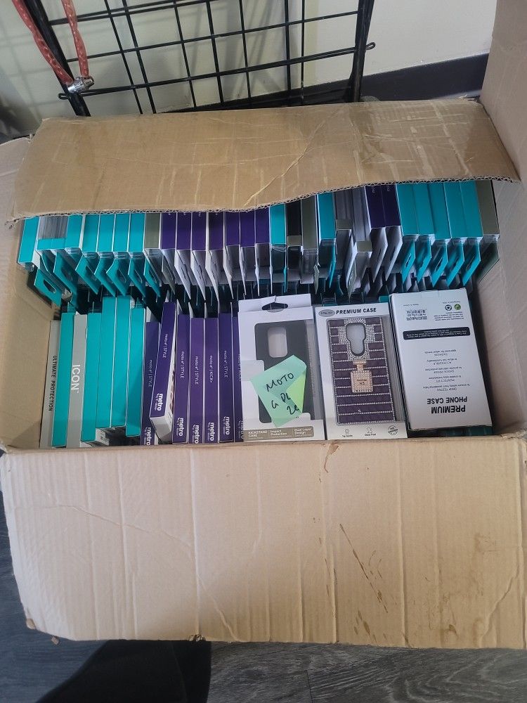 BOX OF BRAND NEW PHONE CASES
