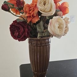 Ceramic Vase With Artificial Flowers.