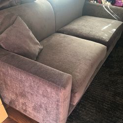 Couches With Carpet And Curtains And Dining Room Table