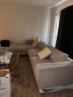 Large grey sectional couch