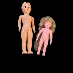Two vintage celluloid dolls
