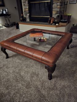 COFFEE TABLE:MARKDOWN $200 (no glass ) Maitland-Smith large leather wrapped coffee table with carved legs and