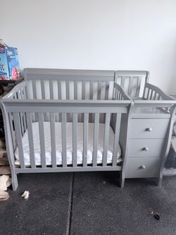 Gray Baby Crib with Attached Changing Table
