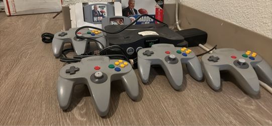 Nintendo 64 with games and four controllers