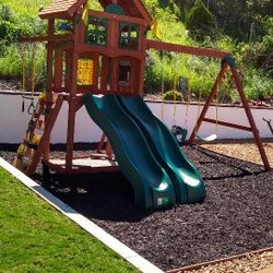 kids playground set, swings, slides, rock wall