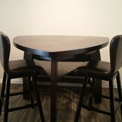 Triangular Bar Height Table With Seating