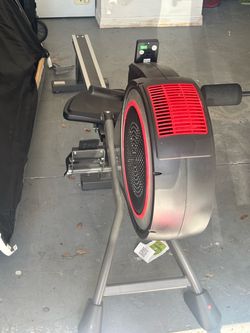 Rowing exercise machine