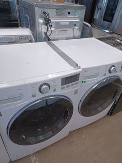 LG FRONT LOAD WASHER AND ELECTRIC DRYER SET