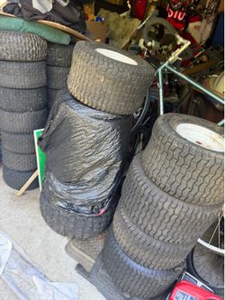 Mower tires with rims.
