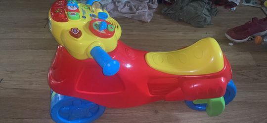 V-Tech two and one learning motorcycle 