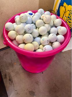 Bucket full of golf balls