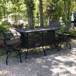 Bar table with four chairs excellent condition the glass shelf in a bag