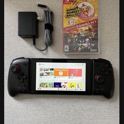 Nintendo Switch System / Console - Includes 2 in 1 Game And Charger power cord . The Nintendo switch has scratches on the front and back and missing l