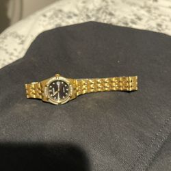 Woman’s Gold Stainless Steel Watch 