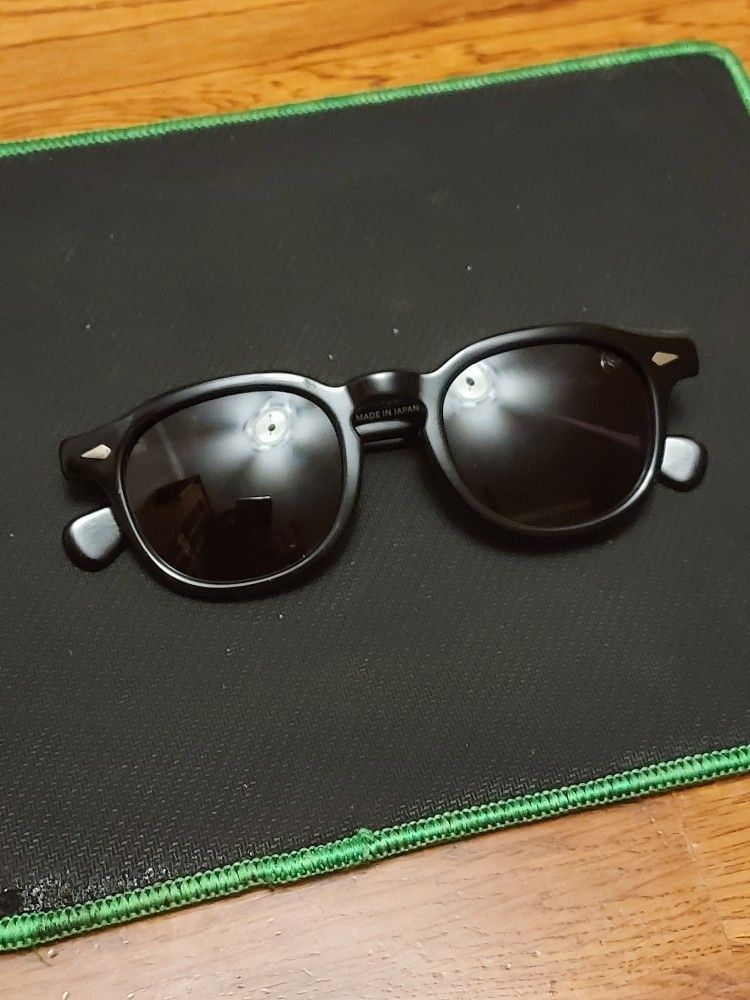 Tart Optical & Co sunglasses.