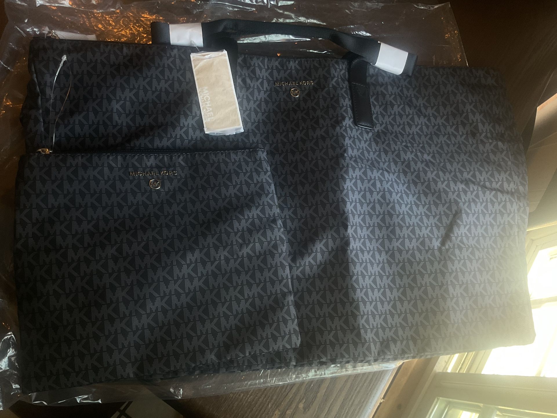 black Michael Kors travel set