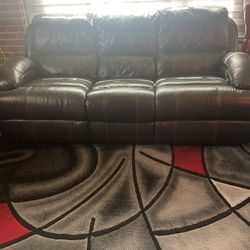 Two Pieces ,sofa And Loveseats ,very nice Power Reclining  sofa. Brown color,