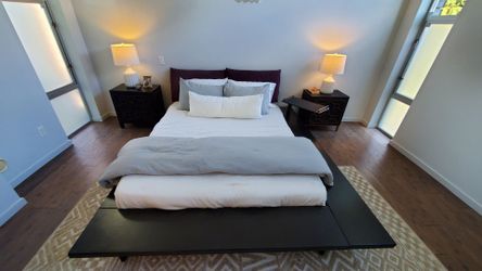 Ligne Roset Maly platform Queen bed black, w/ side table + 3 cushions, Excellent used condition.