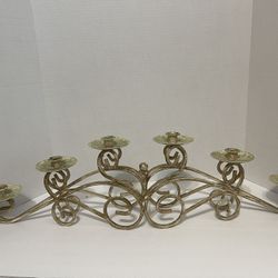 Ornate metal, hand painted candle holder. Holds six candles.  