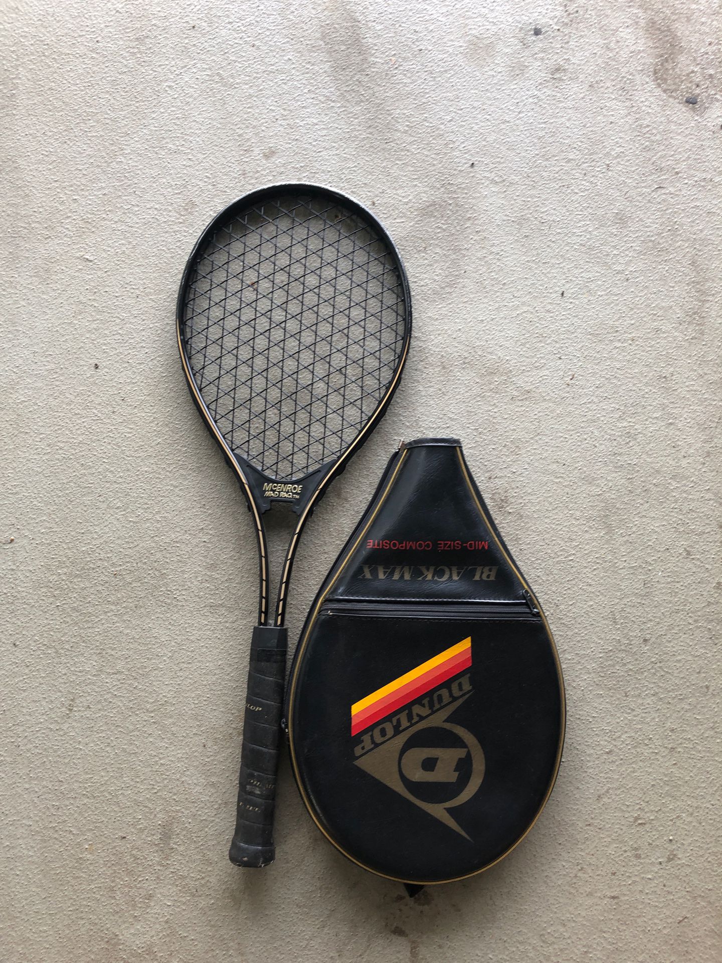 Tennis racket with cover