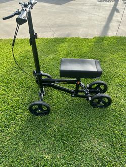 Bless reach knee scooter almost new