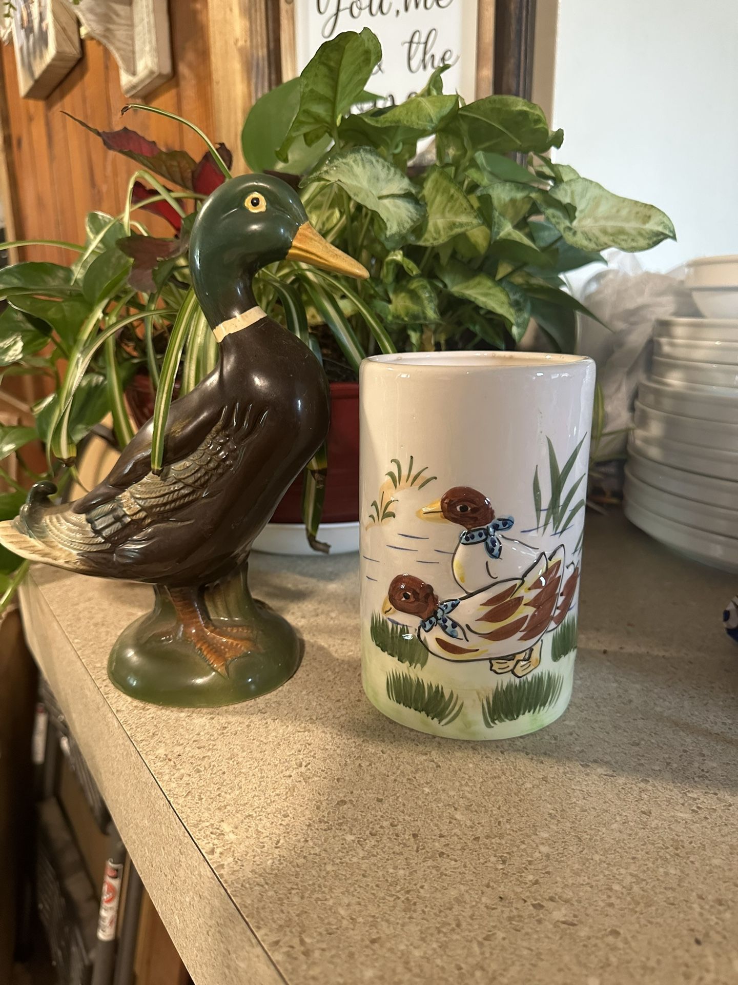 Vintage duck figure with vase