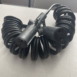 Durable 2-pole auxiliary power cable. Has 4 gauge wire, 100 DCA max. Coiled design for easy storage and flexibility. Great for truck or trailer hookup