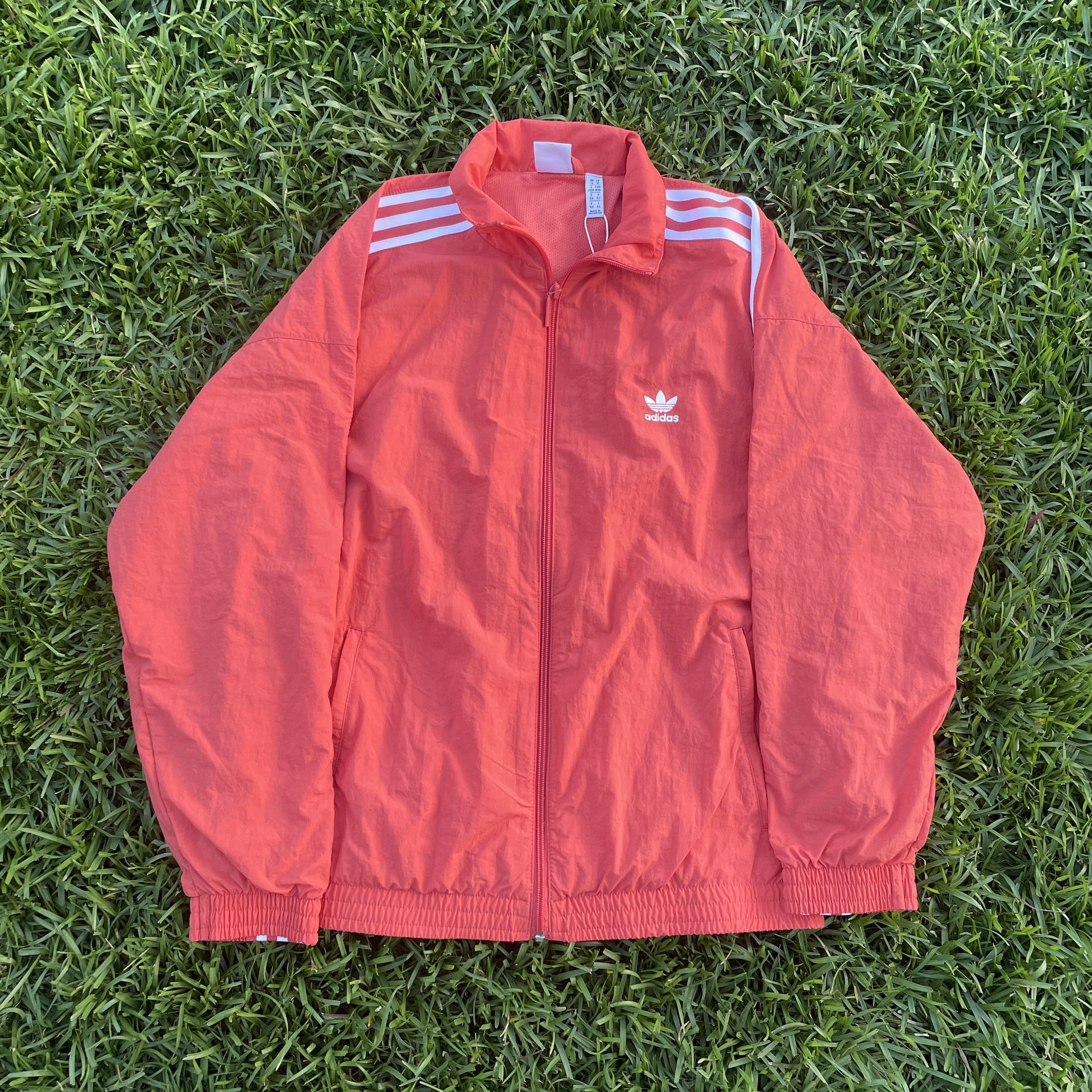 red coral adidas tracksuit top